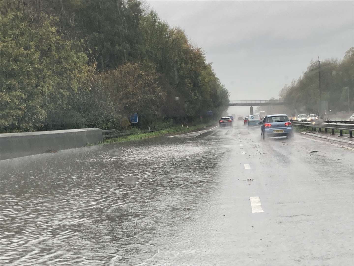Flooding on the inside lane of the London-bound M2 between Junction 5 and 4. Picture: John Nurden