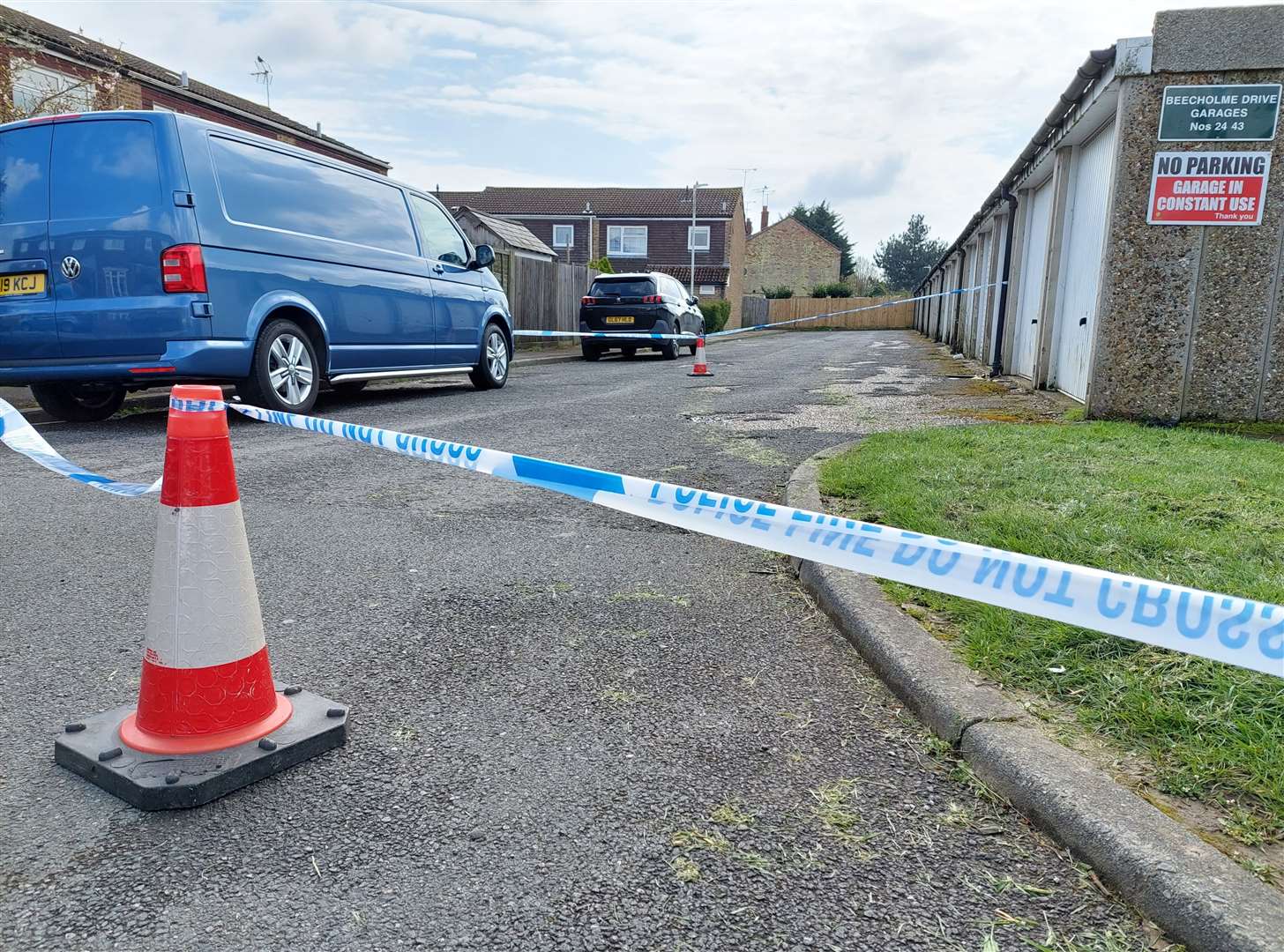 Police taped off a block of garages in Beecholme Drive