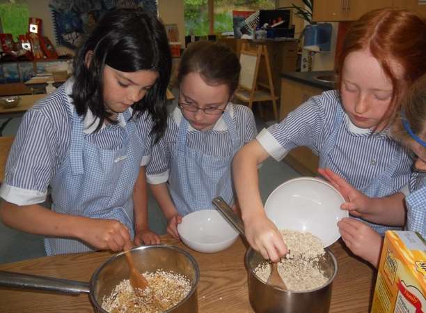 Mixing oats for the flapjacks The Granville School