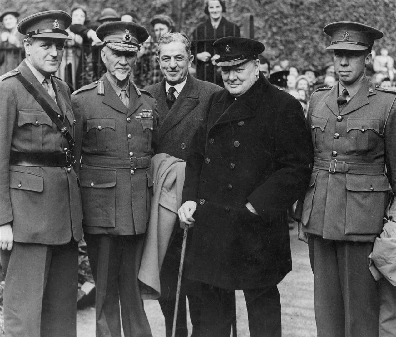 Sir Winston Churchill, the Prime Minister, and General Smuts, pose for Kent Messenger photographer, Mr E Jeffery, at Kearsney Station during their visit to Dover in 1942