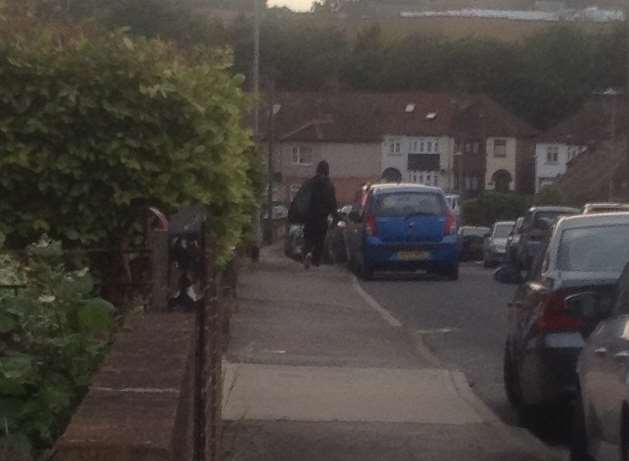 The man pictured in Bellman Avenue after he reportedly tried to gain access to a property