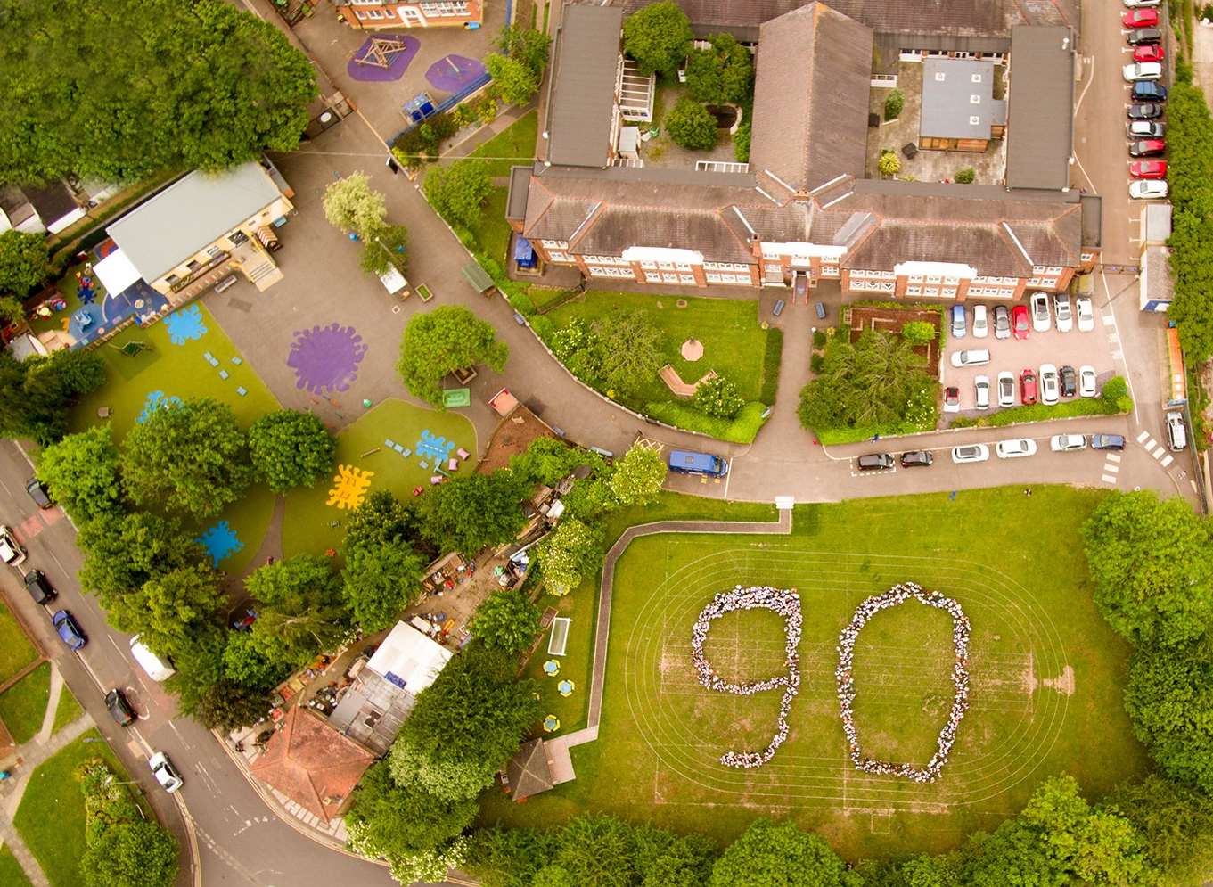 Children formed the number 90 for this photo taken by a drone. Picture courtesy of Whitehill Primary School