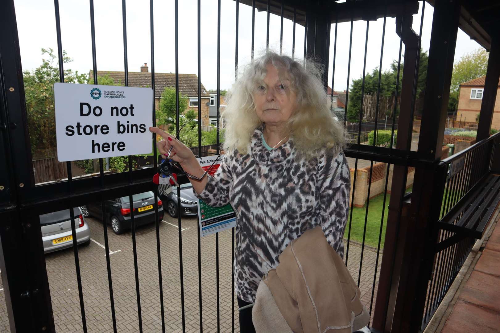 Paula Herbert at The Maples, The Broadway, Minster, Sheppey, complaining that Optivo won't let them keep their rubbish bins upstairs