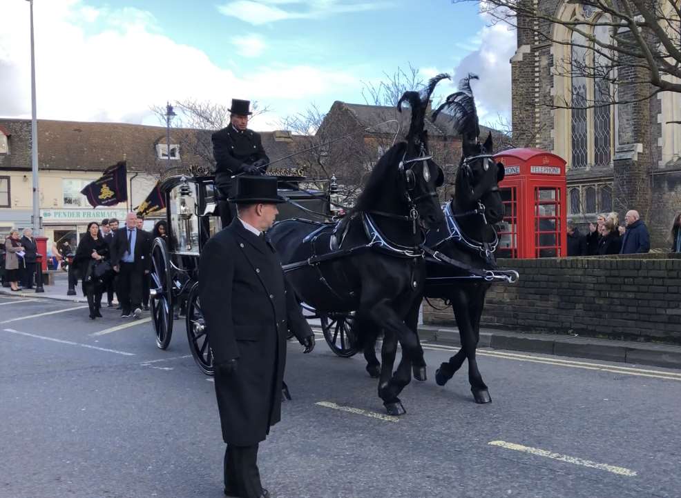 Tony Larkin's body was taken away by horse and carriage after the funeral