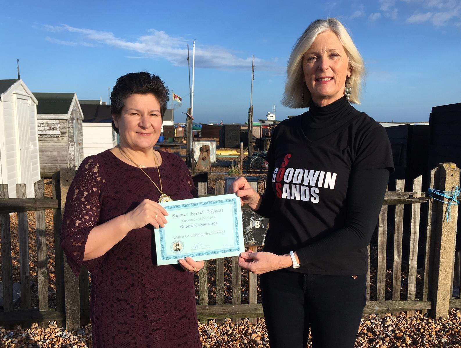 Sue Le Chevalier presents the cheque to campaigner Joanna Thomson. Picture: Goodwin Sands SOS
