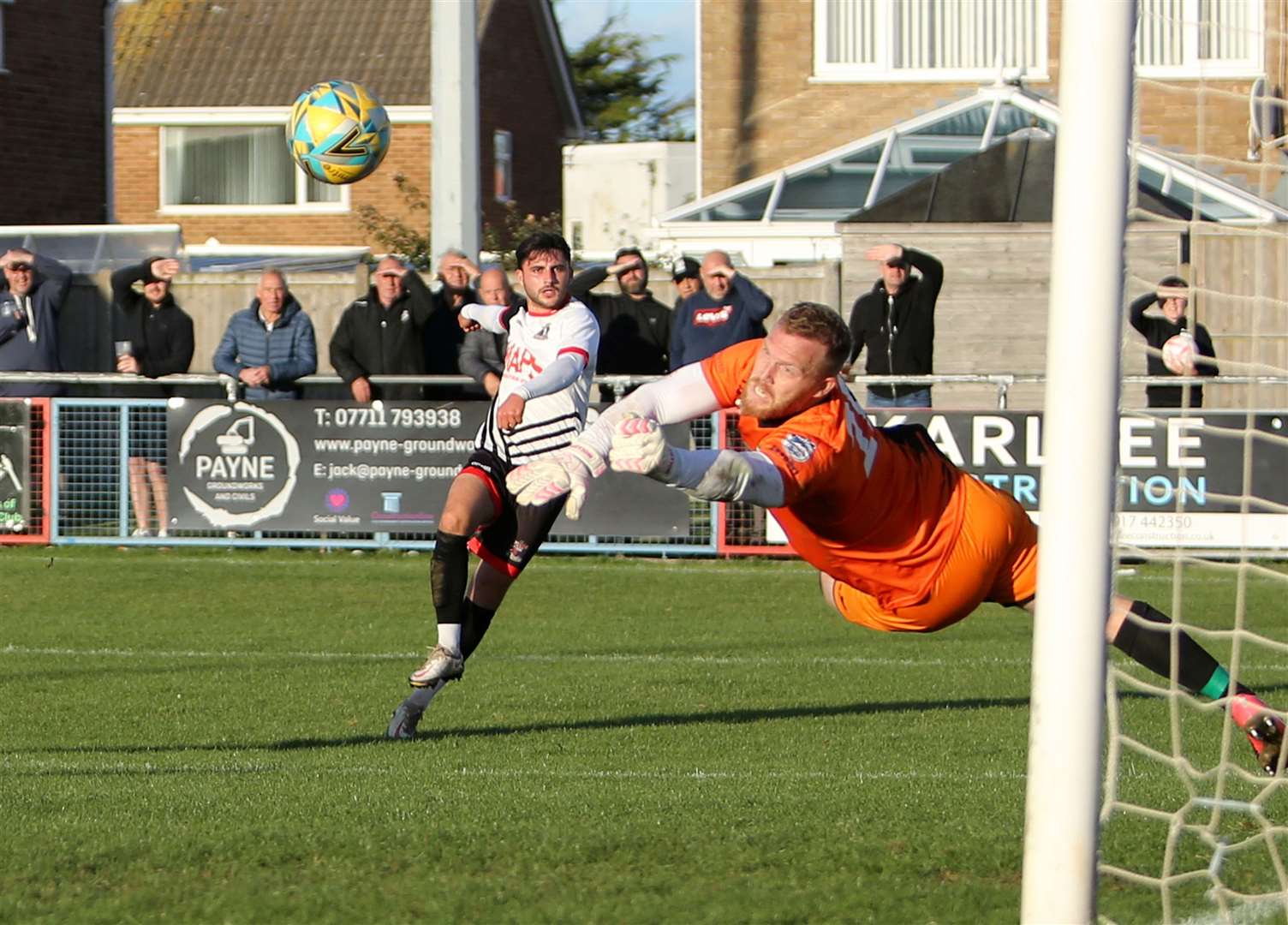 Deal’s defender Jack Penny sees his shot saved by Snodland goalkeeper Adam Molloy. Picture: Paul Willmott