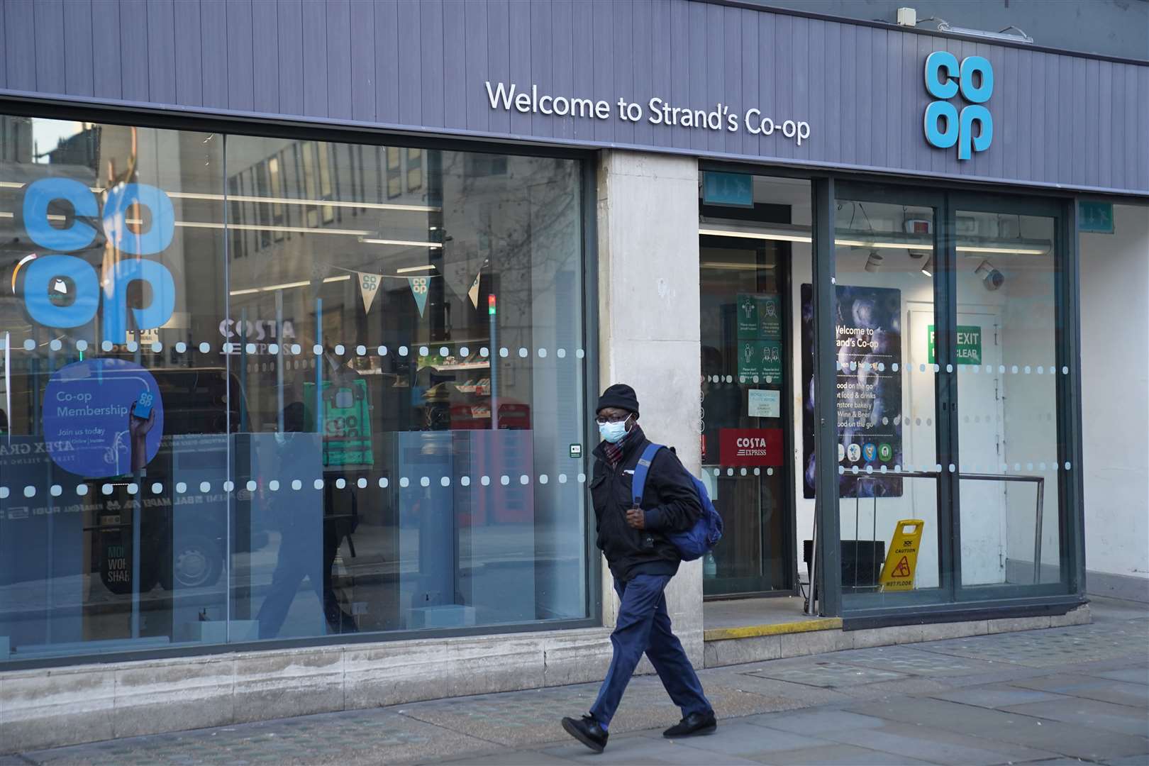 The Co-Op store on The Strand which was allegedly visited by a person with a suitcase to purchase wine for a party being held in Downing Street (Stefan Rousseau/PA)