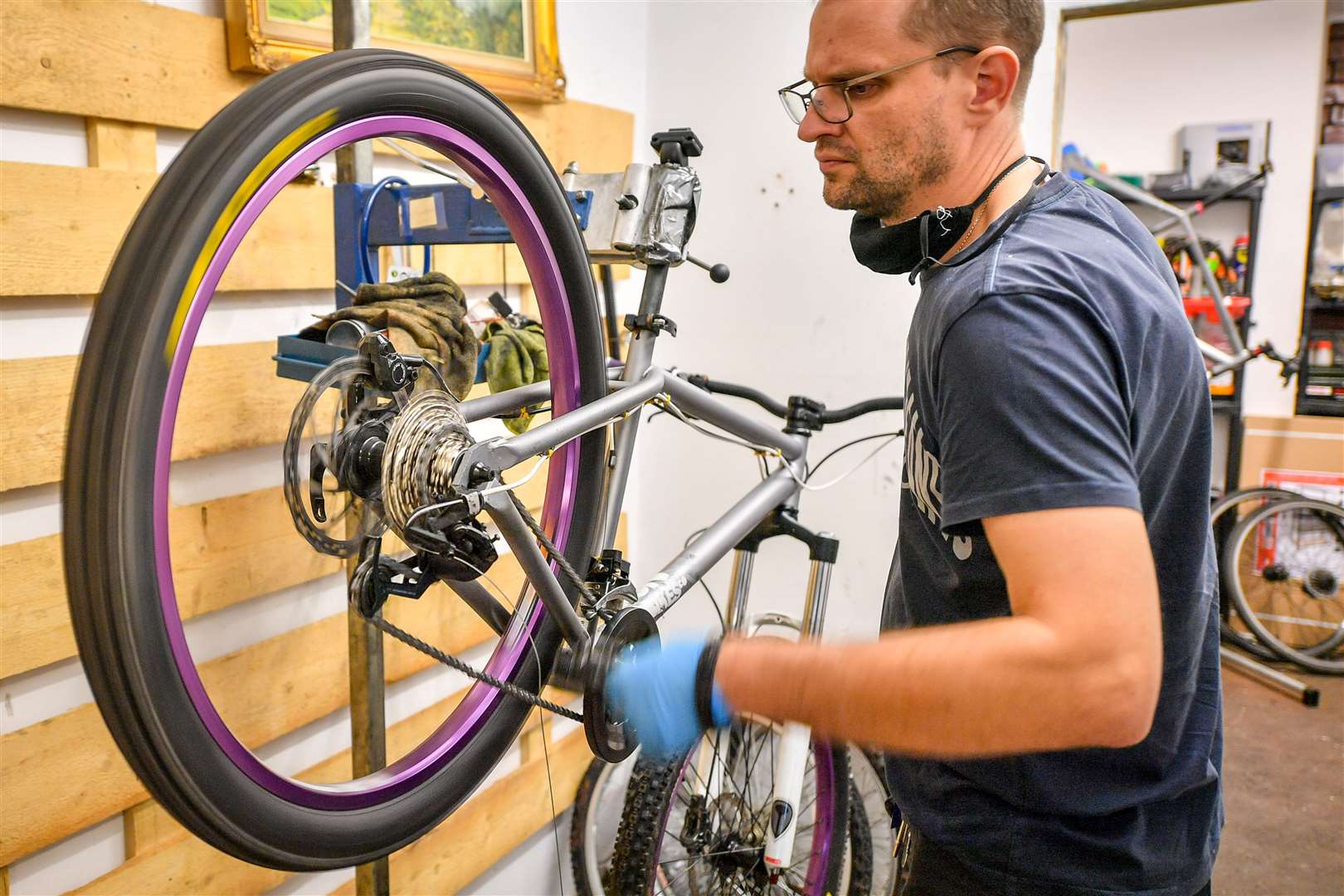 Andrew Bebesi, owner of bike repair service Briscycle, is participating in the Government’s bike repair scheme (Ben Birchall/PA)