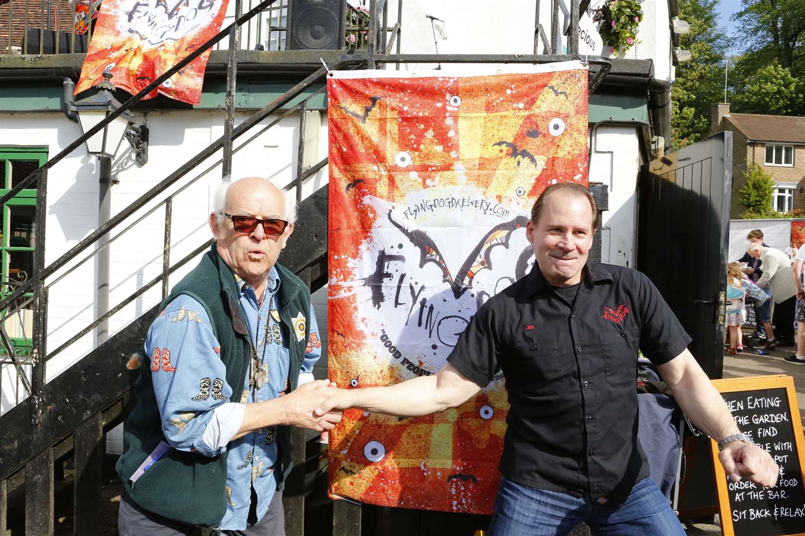 Artist Ralph Steadman with Jim Carusao the CEO of the American Flying Dog Brewery at an event in Loose in 2016