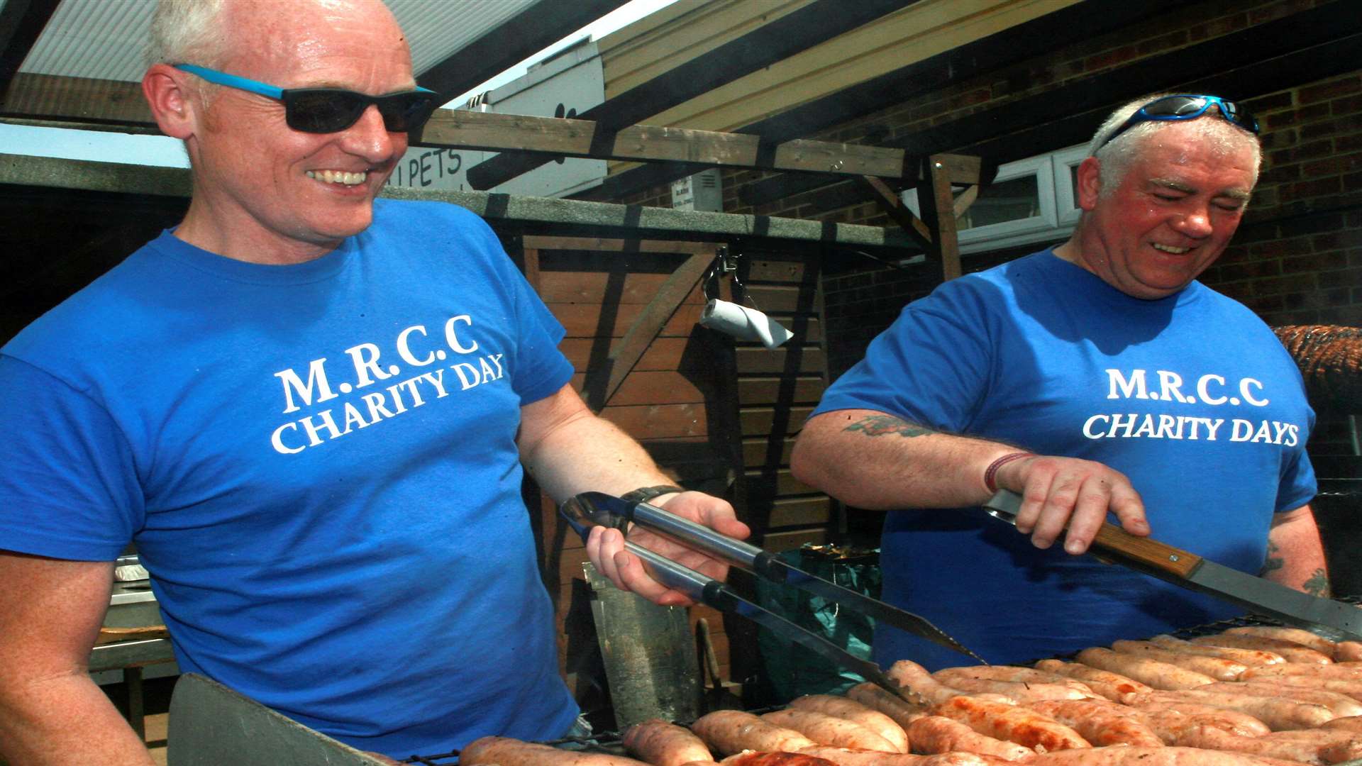 Mike Knowles (left) and Doug Cowie (right) had the hot job of cooking the food at the funday