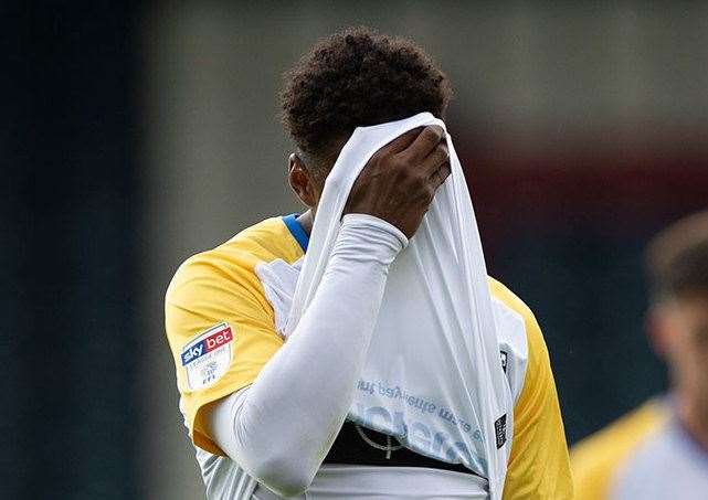 Brandon Hanlan covers his face after the Gills perform badly at Rochdale Picture: Ady Kerry