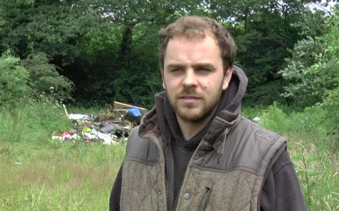 Jos Brynmor-Jones, from Harvel House Farm, Harvel, with the fly-tipping dumped on his family's land