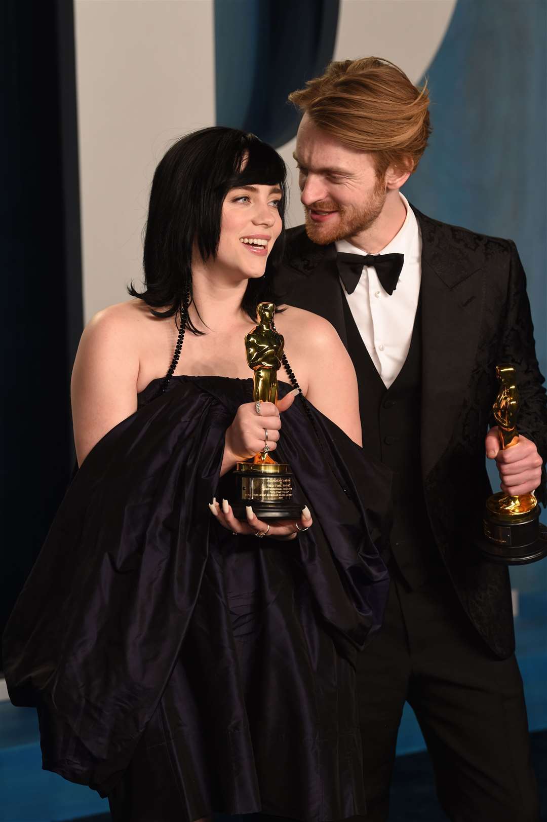 Billie Eilish and Finneas O’Connell with their Academy Awards in 2022 (Doug Peters/PA)