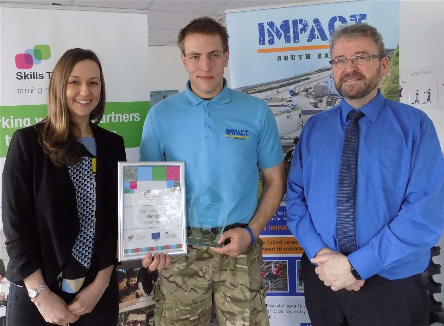 Operations Manager at Skills Training UK, Anna Wise, and director of Concept Training, Chris Pound, present Danny Hague with his Skills Training UK Learner Progression award. Picture: Skills Training UK