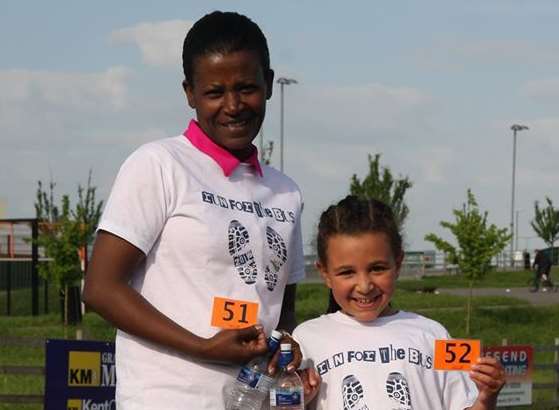 Ruth Dalton, six, and with her mum, Tigist, was the youngest member of the Run 4 the Bus team