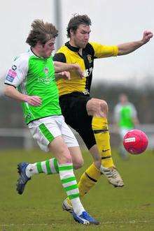 Ashford Town's Tom Murphy in action in the 1-0 defeat to Burgess Hill Town