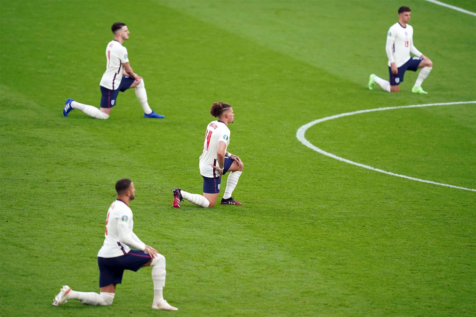 England players take the knee at the start of the Euro 2020 semi-final against Denmark (Mike Egerton/PA)