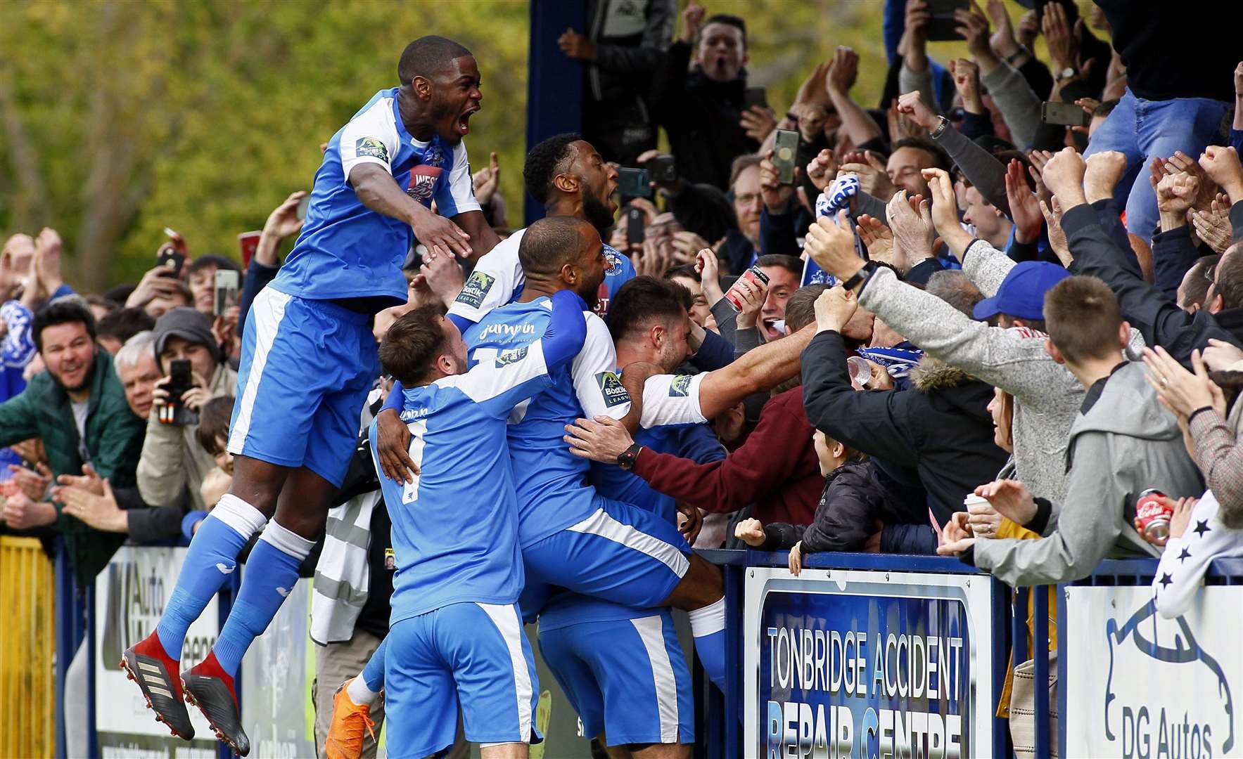 Tonbridge Angels players celebrate with fans during their play-off final win over Merstham in 2019. Picture: Sean Aidan