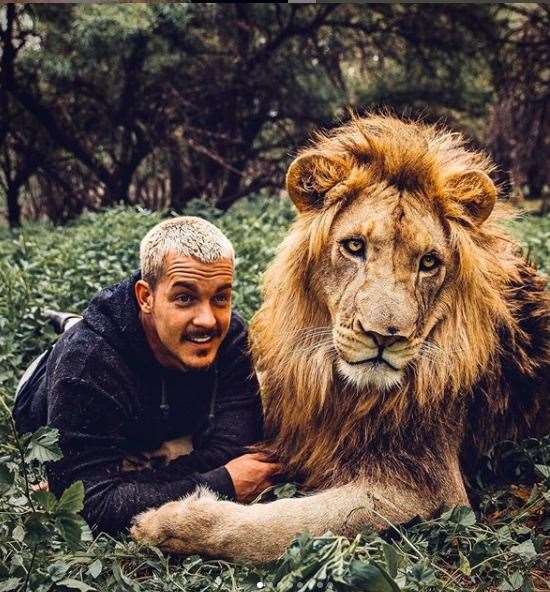 Dean Schneider with one of his prized lions. Picture: @dean.schneider