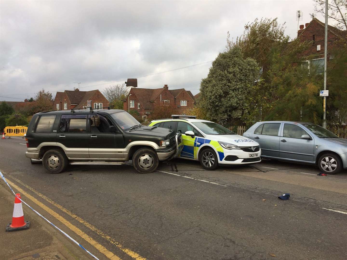 There appears to have been a collision between a 4x4 and a police car