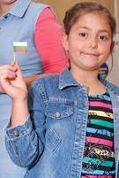 Victoria Phillips, whose mother is Bulgarian and father is English, holding the Bulgarian flag.