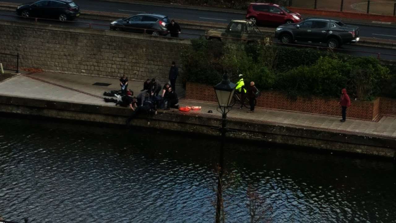 Police attempt to revive Mr newholm by the water's edge (1129049)