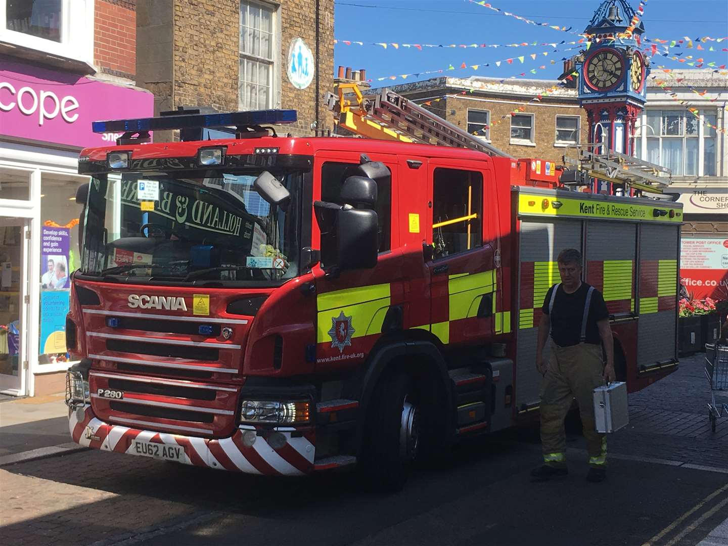 Firefighters outside Holland & Barrett shop in Sheerness High Street (13368382)