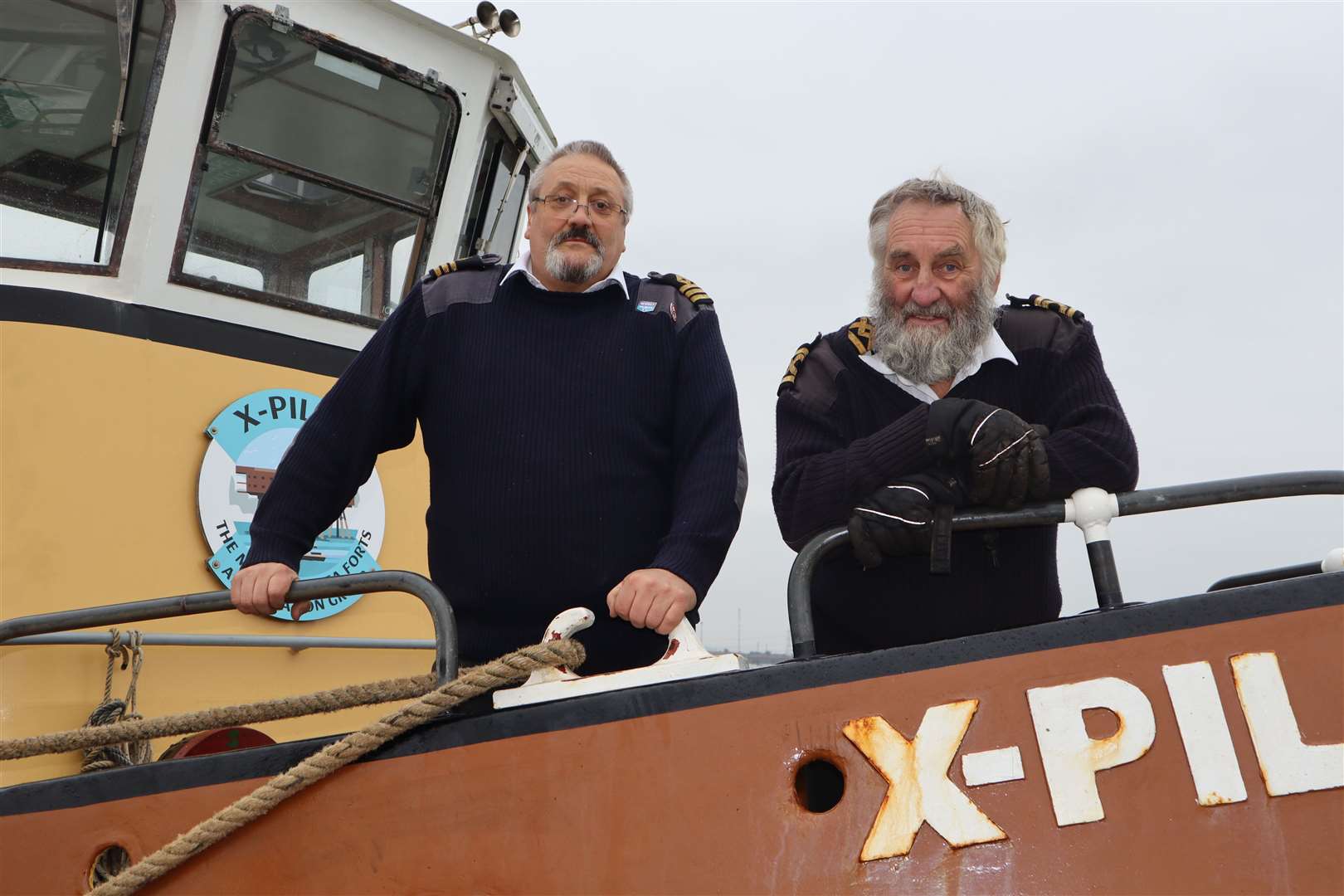 First Mate Mark Thorne, left, and skipper Capt Alan Harmer aboard the X-Pilot at Queenborough