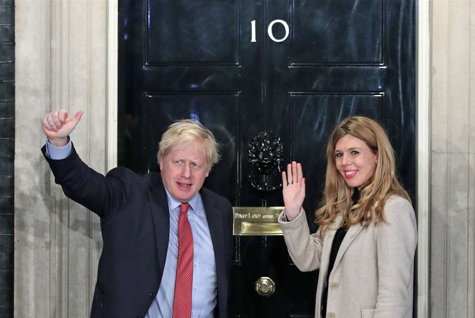 Prime Minister Boris Johnson and fiancee Carrie Symonds arrive in Downing Street (Yui Mok/PA Images)