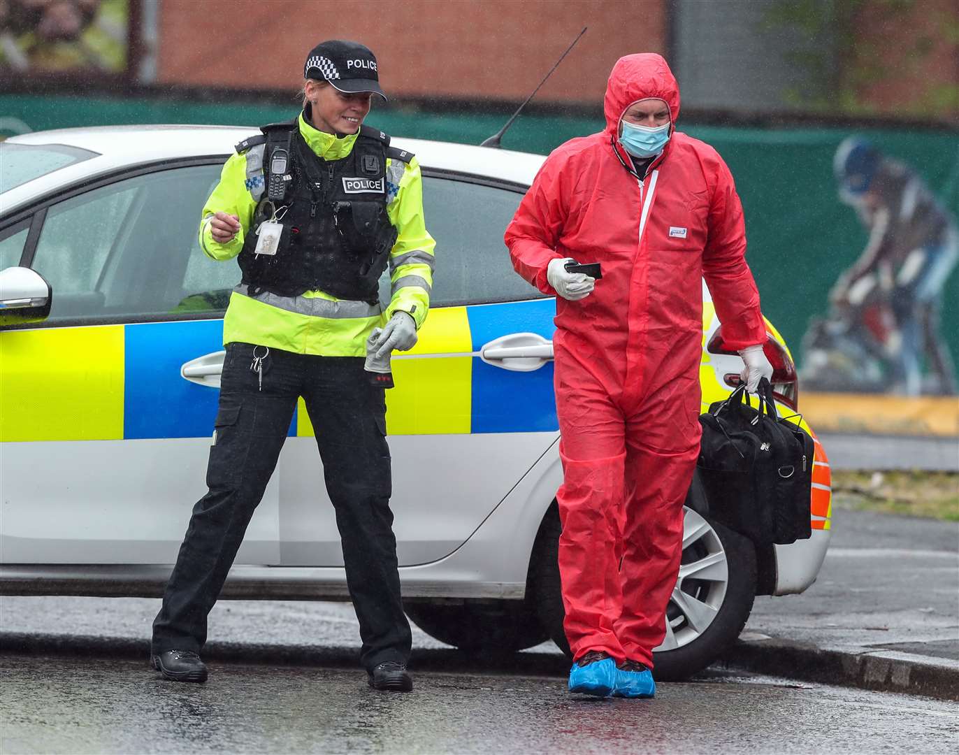 Police at the scene (Peter Byrne/PA)