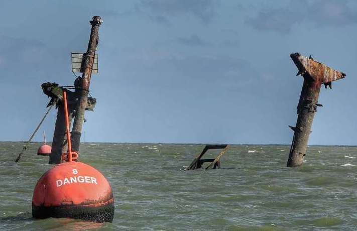 Masts and danger buoy of the SS Richard Montgomery bomb ship off the coast of Sheerness. Picture: Margaret Flo McEwan