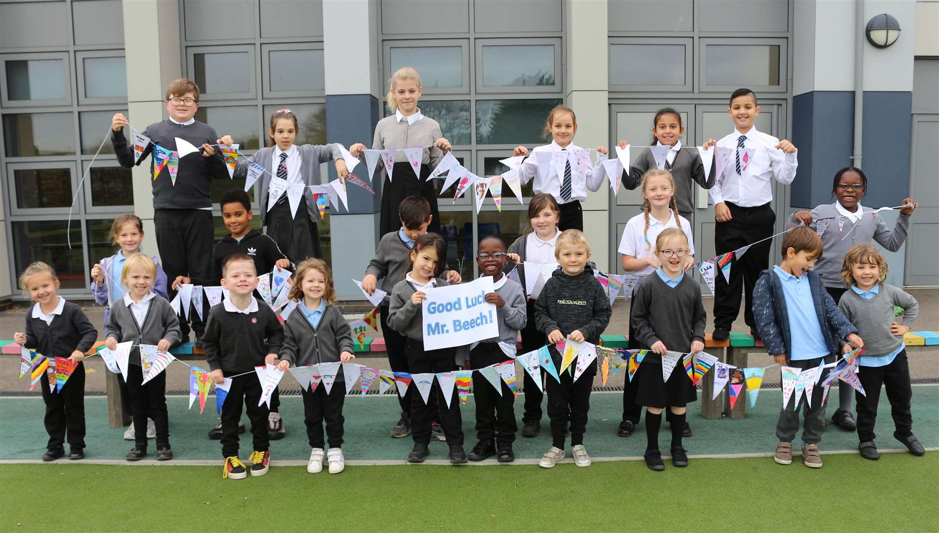 Pupils at Martello Primary school in Folkestone wish farewell to principal Wayne Beech. Picture: Turner Schools