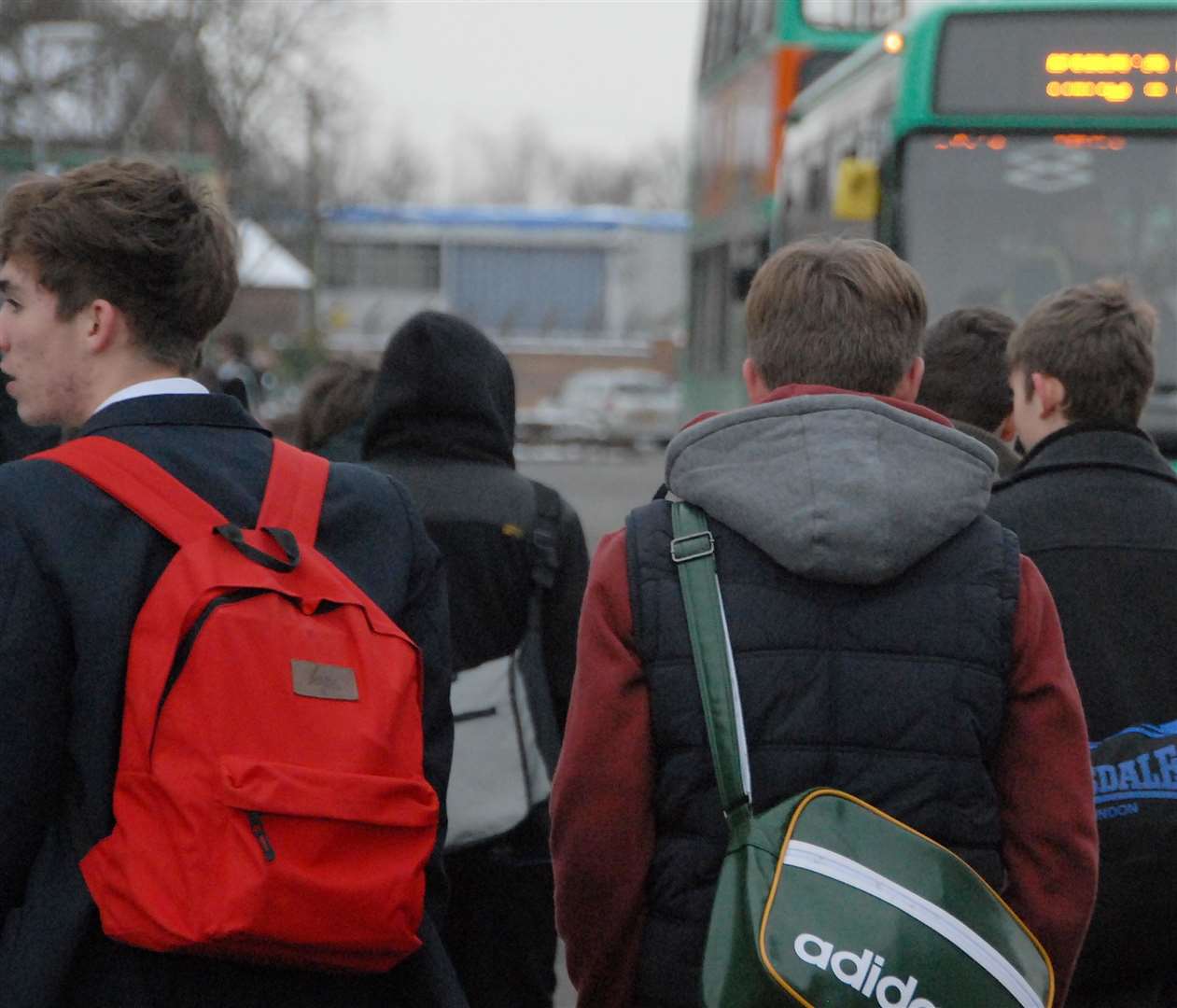 School pupils wait for a bus Picture: Tim Wilson