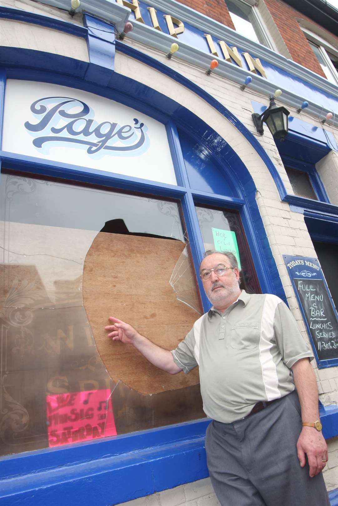 Popular landlord Michael Page was unhappy in 2008 when a pane of glass was broken outside his pub. Picture: John Westhrop