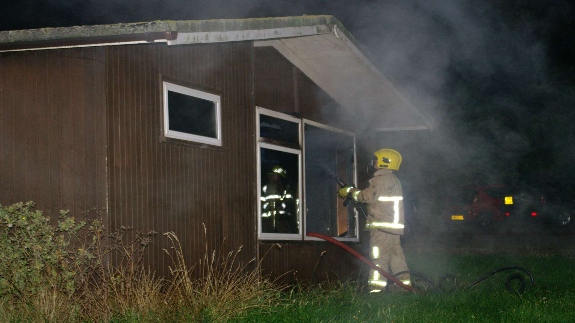 Firefighters tackle the blaze at Allhallows Leisure Park. Picture Stanley Arrowsmith