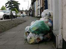 Bin bags stacked up outside Chris Stewart's Wincheap home