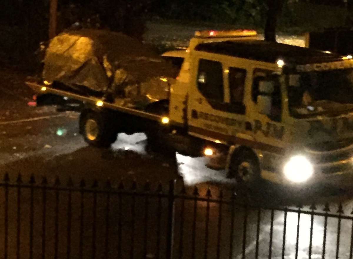 The car involved in the hit and run in London Road, Gravesend, is towed away by a recovering vehicle
