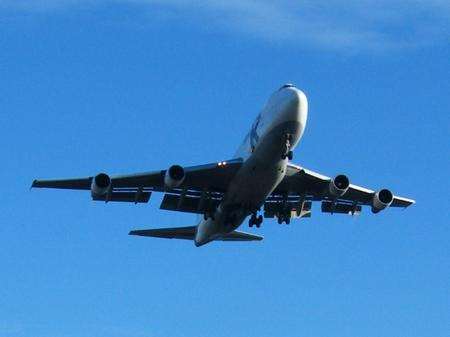 An aeroplane lands at Kent International Airport, Manston
