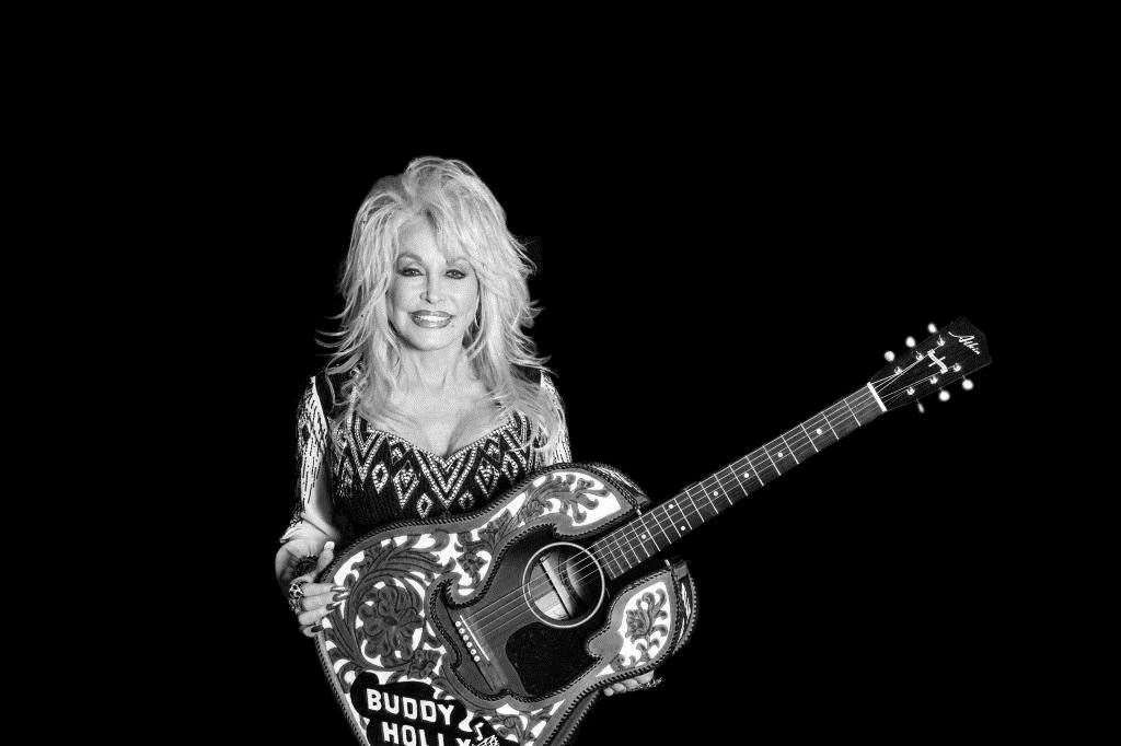 Dolly Partin with her Atkin guitar