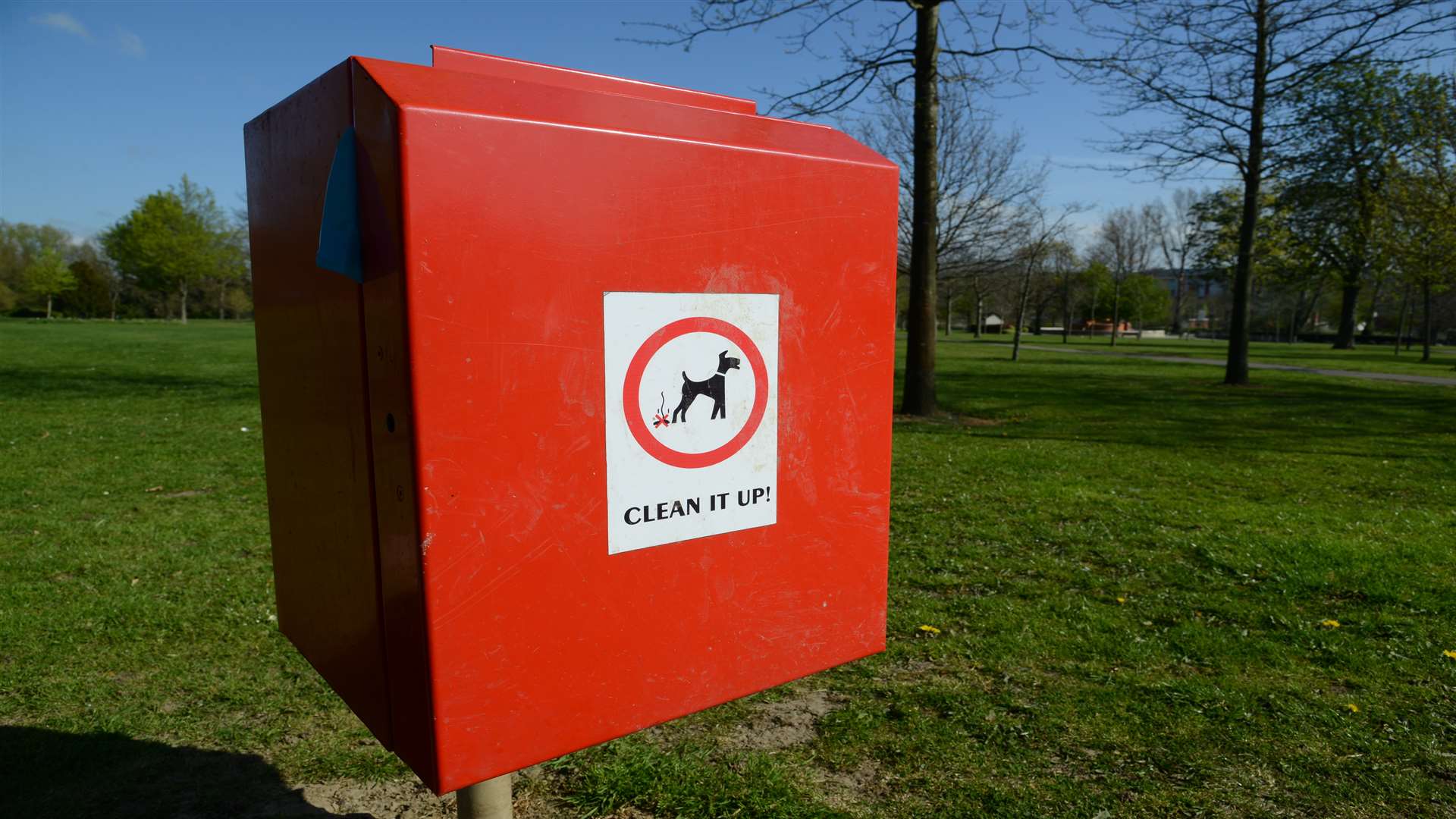 A bin in Victoria Park, Ashford, where signs warning about fines for dog fouling were hard to spot