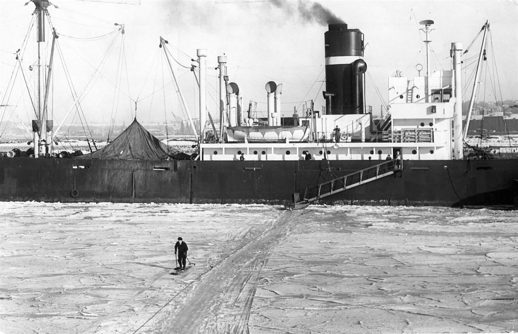 A sailor skis across the frozen River Medway at Rochester from his ship to visit the shops on January 25, 1963