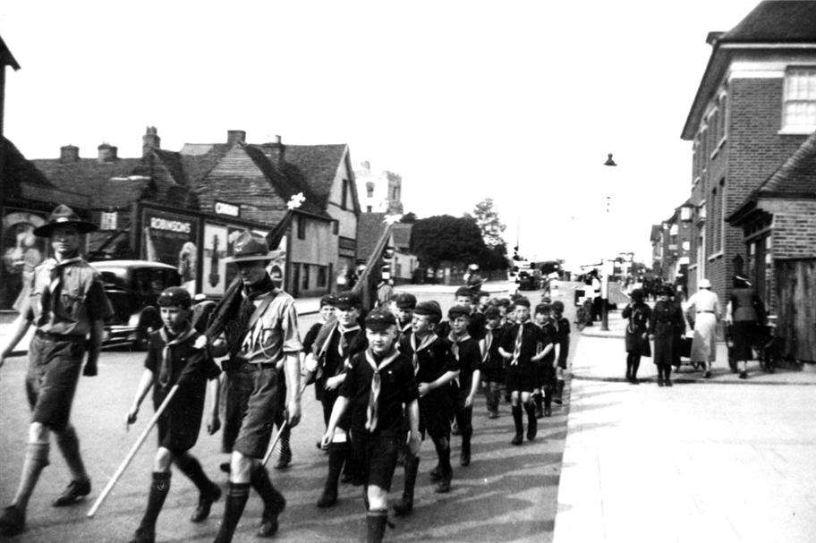 The 8th Dartford Cubs on Church parade, probably in April 1966. Cub Crispin Whiting is at the front, between the two broad-brimmed hatted Scout leaders.