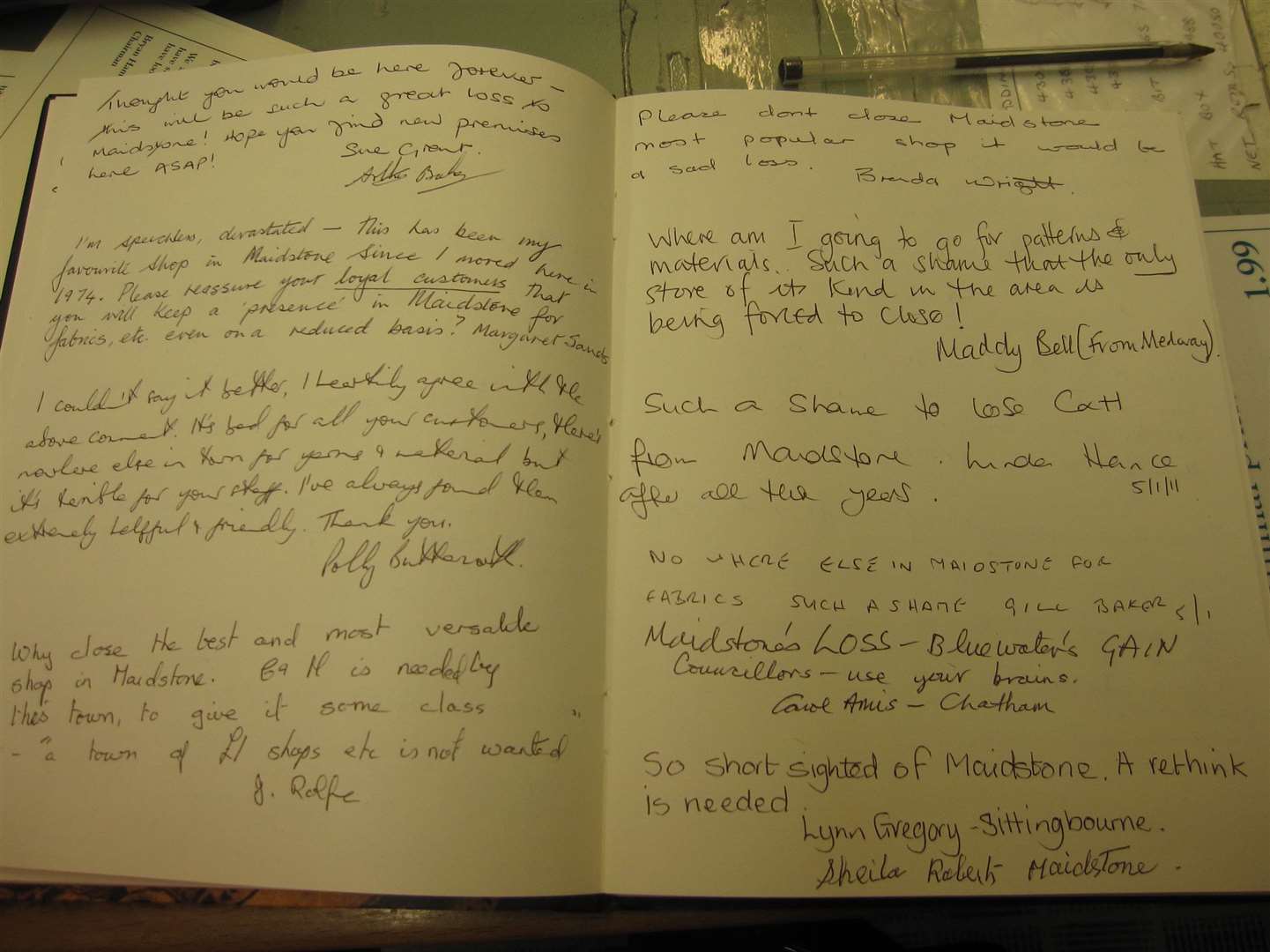 Messages left by customers in a book of condolences for C&H Fabrics, in Week Street, Maidstone