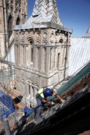 Craftsmen working on the lead roof of the Cathedral's south east transept