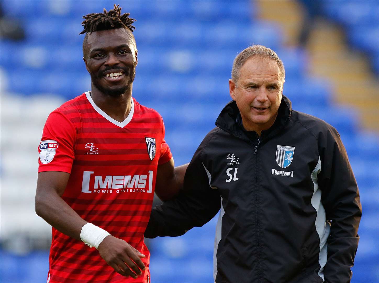 Steve Lovell is all smiles with former Gills defender Gabriel Zakuani. Picture: Andy Jones (43953272)