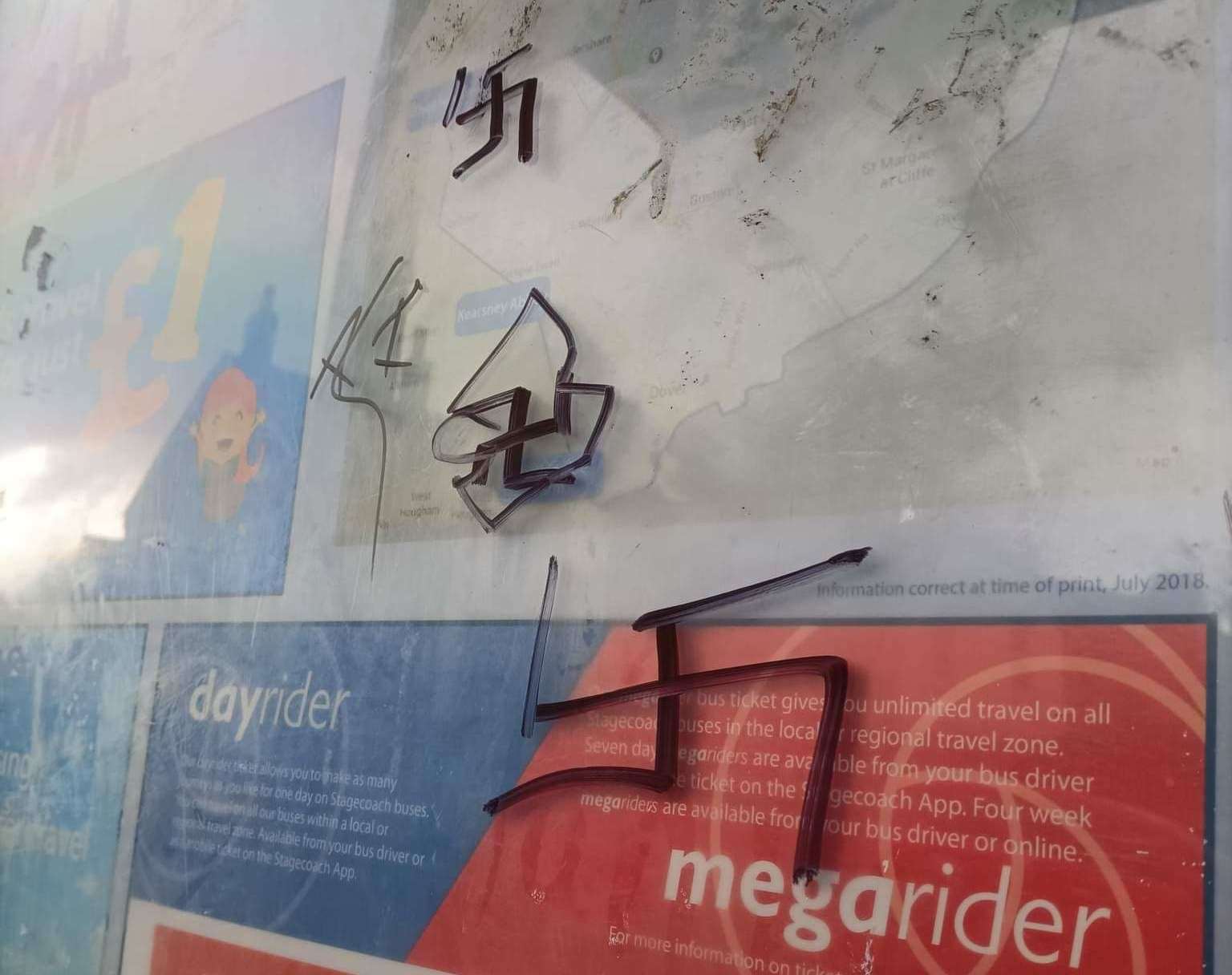 Graffiti of swastikas on a bus stop in Dover. Picture: Jordan Graham