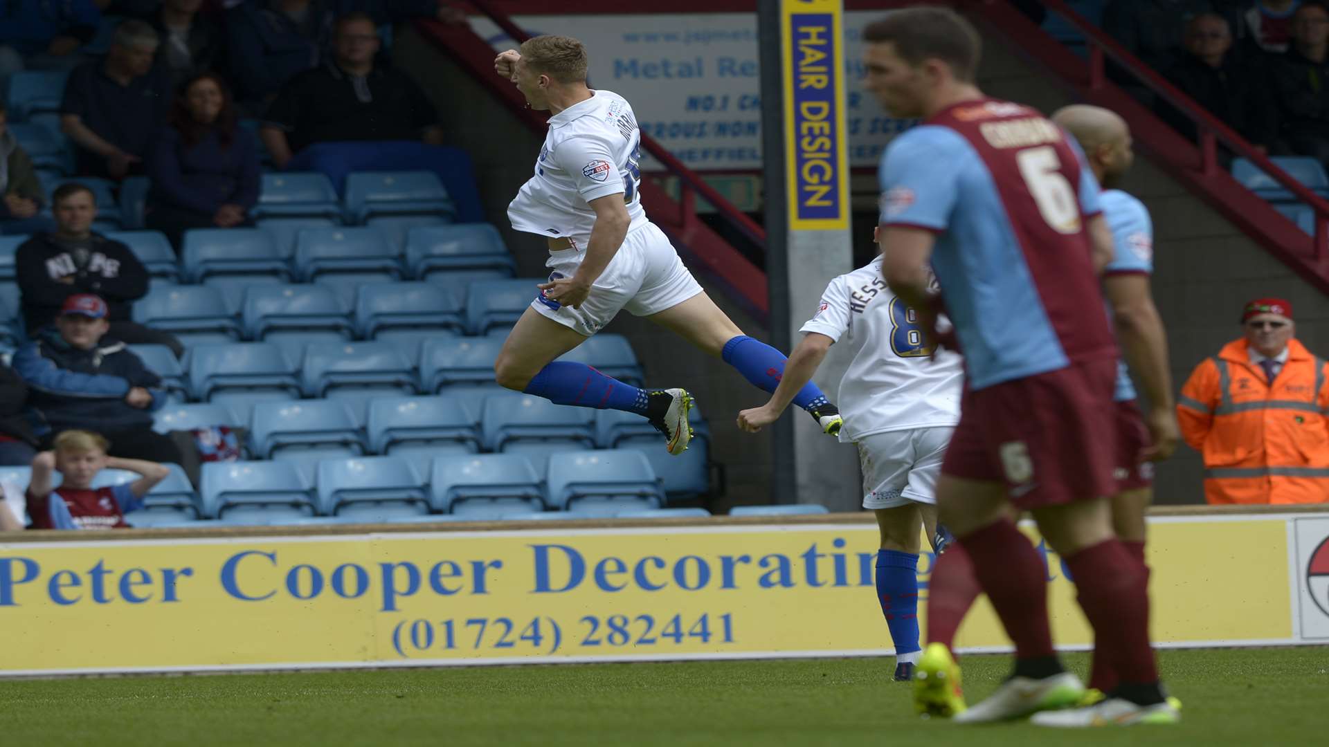 A delighted Luke Norris celebrates his goal at Glanford Park Picture: Barry Goodwin