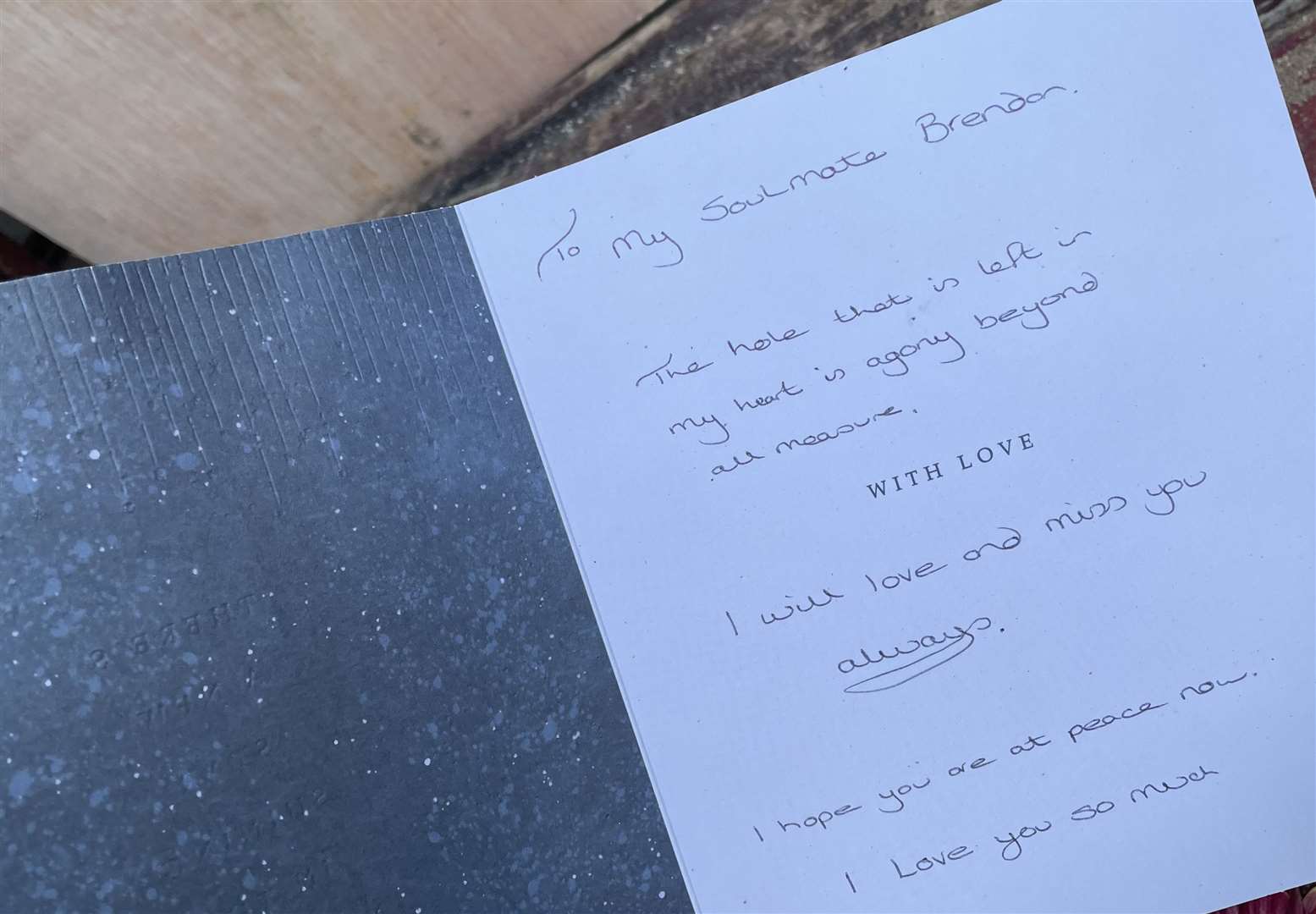 A handwritten card at the site of the crash