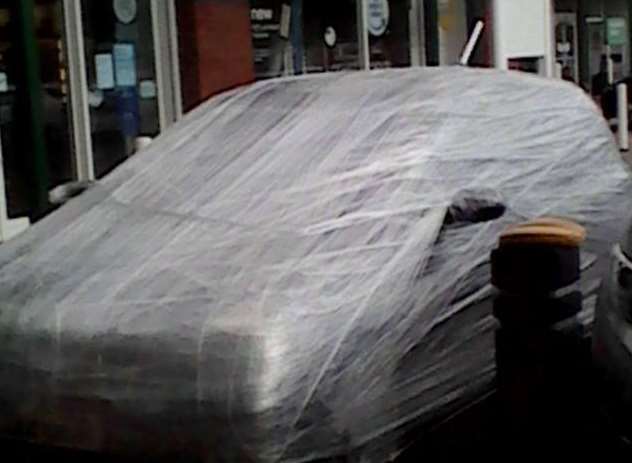 A car has been wrapped in clingfilm in Wincheap, Canterbury. Picture Toni Ashby