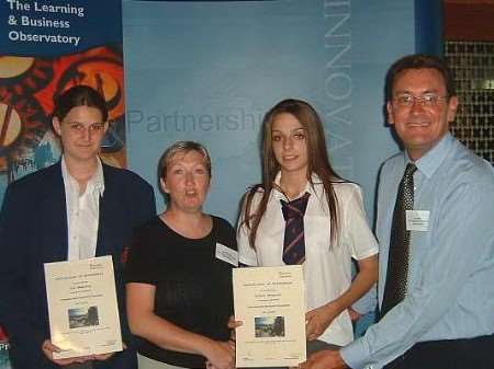 Students Joe Manning and Lydia Hawgood receive their awards at the Undertanding Enterprise presentation evening